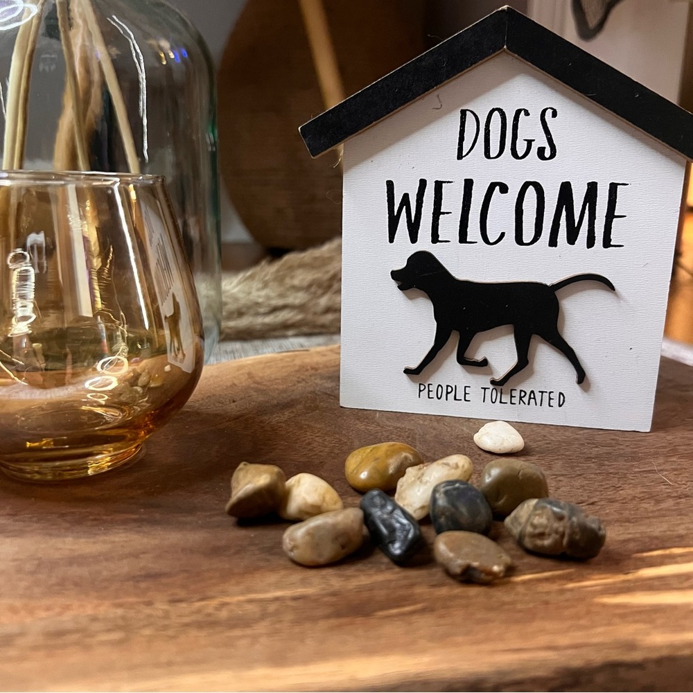 Small “Dogs Welcome” home decor sign